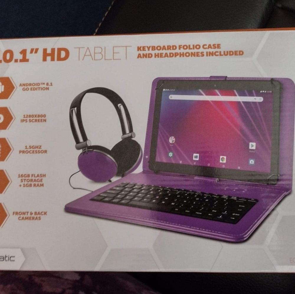 10 inch Tablet with keyboard and headphones.
